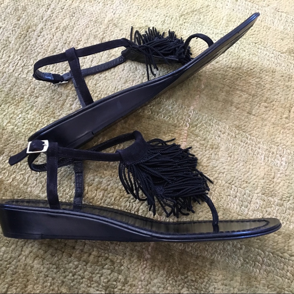 Black fringe top low wedge sandal.
